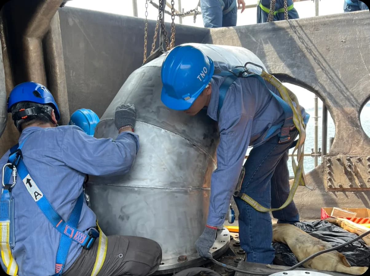 TNO team performing a retrofit onboard a vessel