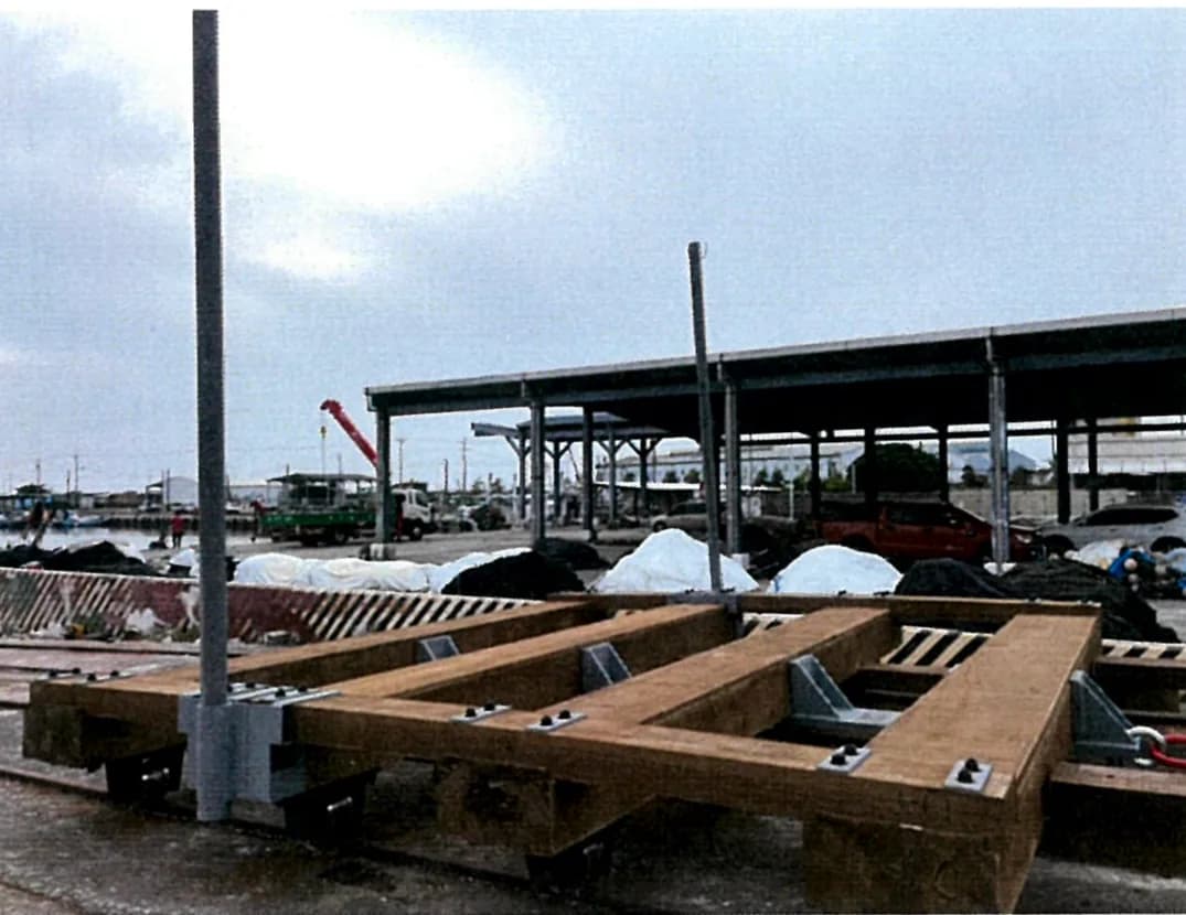 The new cradle seated on the rails, every connection between timber and steelwork bolted down.